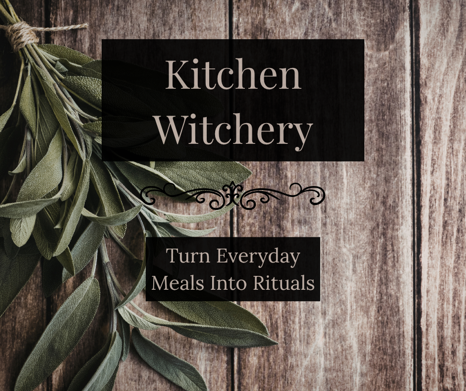 kitchen witchery herbs on rustic wooden table with sage bundle and simple meal ritual concept