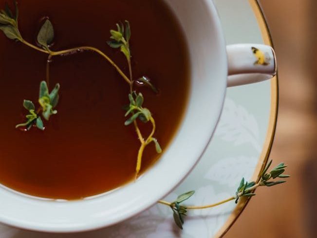 elegant herbal tea in vintage cup