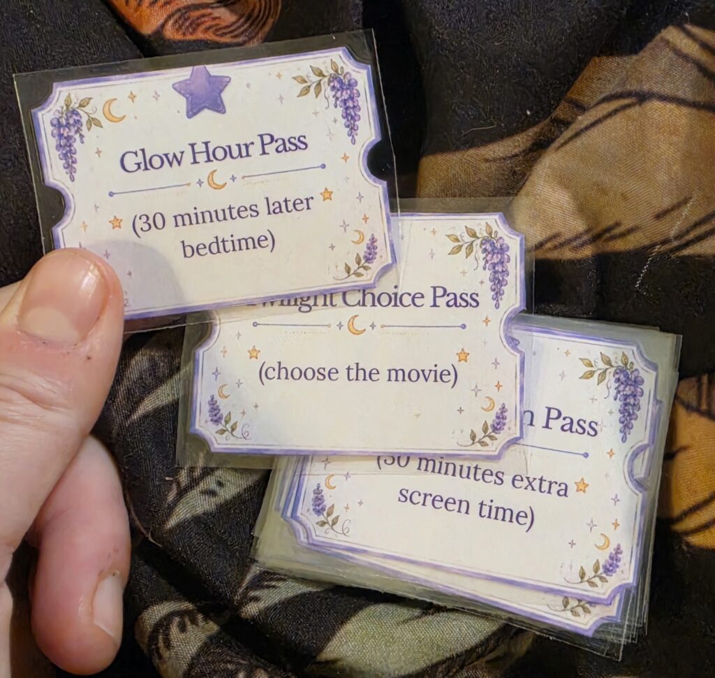 Laminated Witch Bucks reward coupons including a Glow Hour Pass and movie choice pass